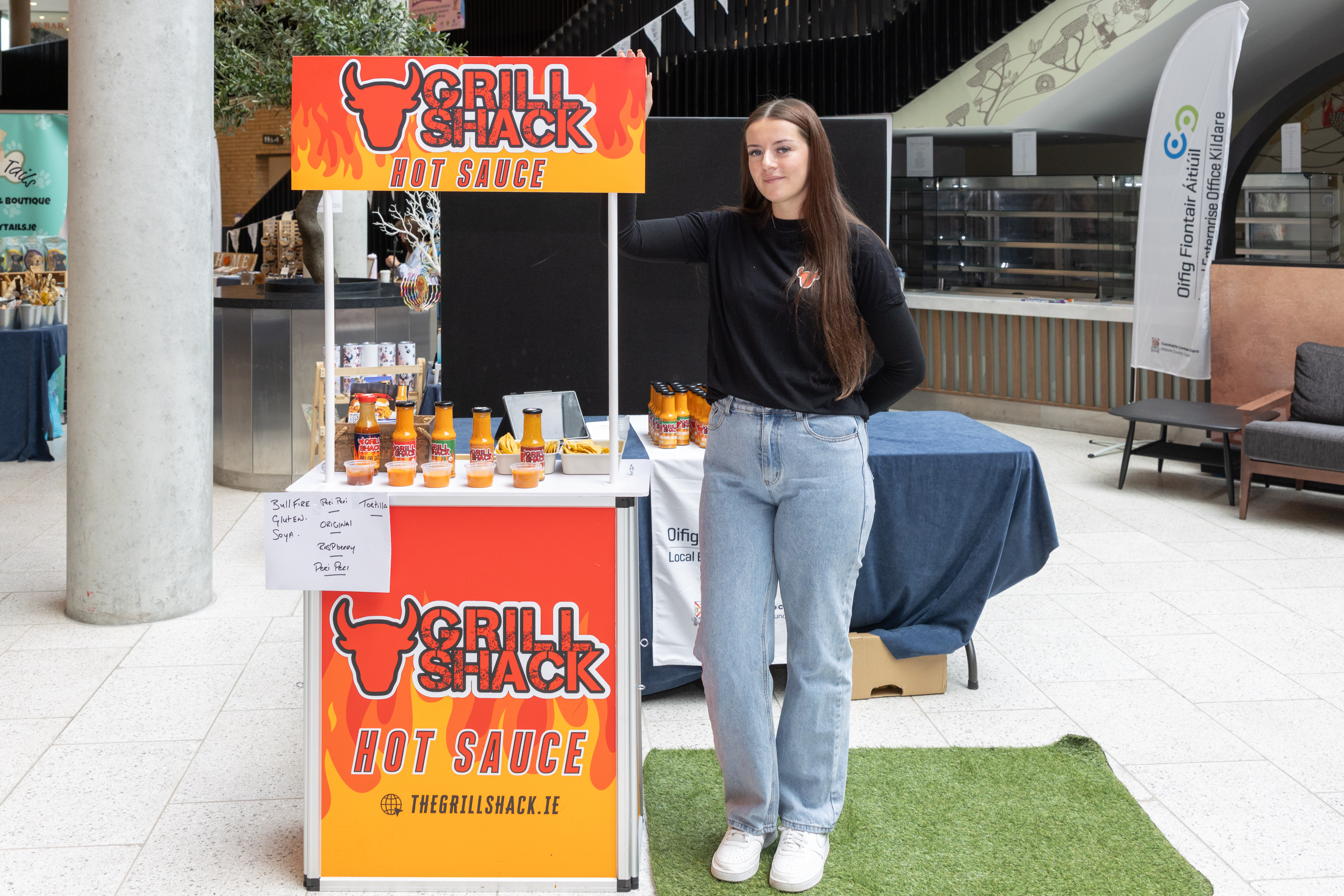 Person with hot sauce stall.